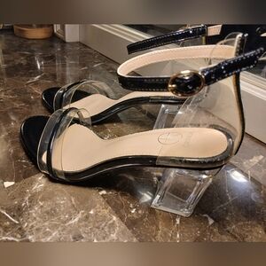 Elegant Black and Clear Strap Heels